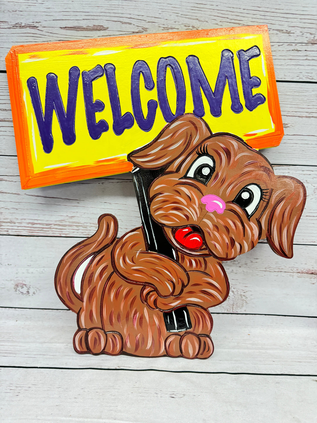 Dog Holding a Hand-Made Welcome Sign created  by Mary Amick | Yard Art Decor and More.