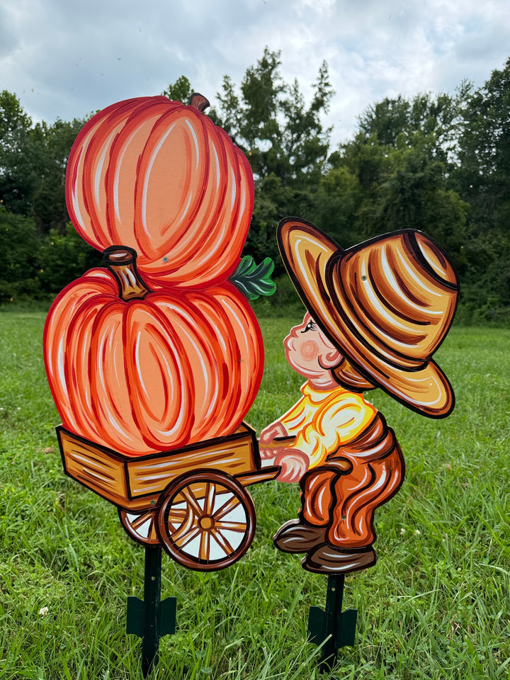 Fall Boy Pushes a Pumpkin Cart Yard Art Decorations