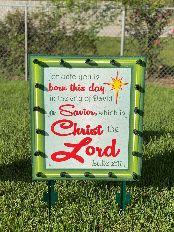 Lighted Luke 2:11 sign with red border Christmas yard art