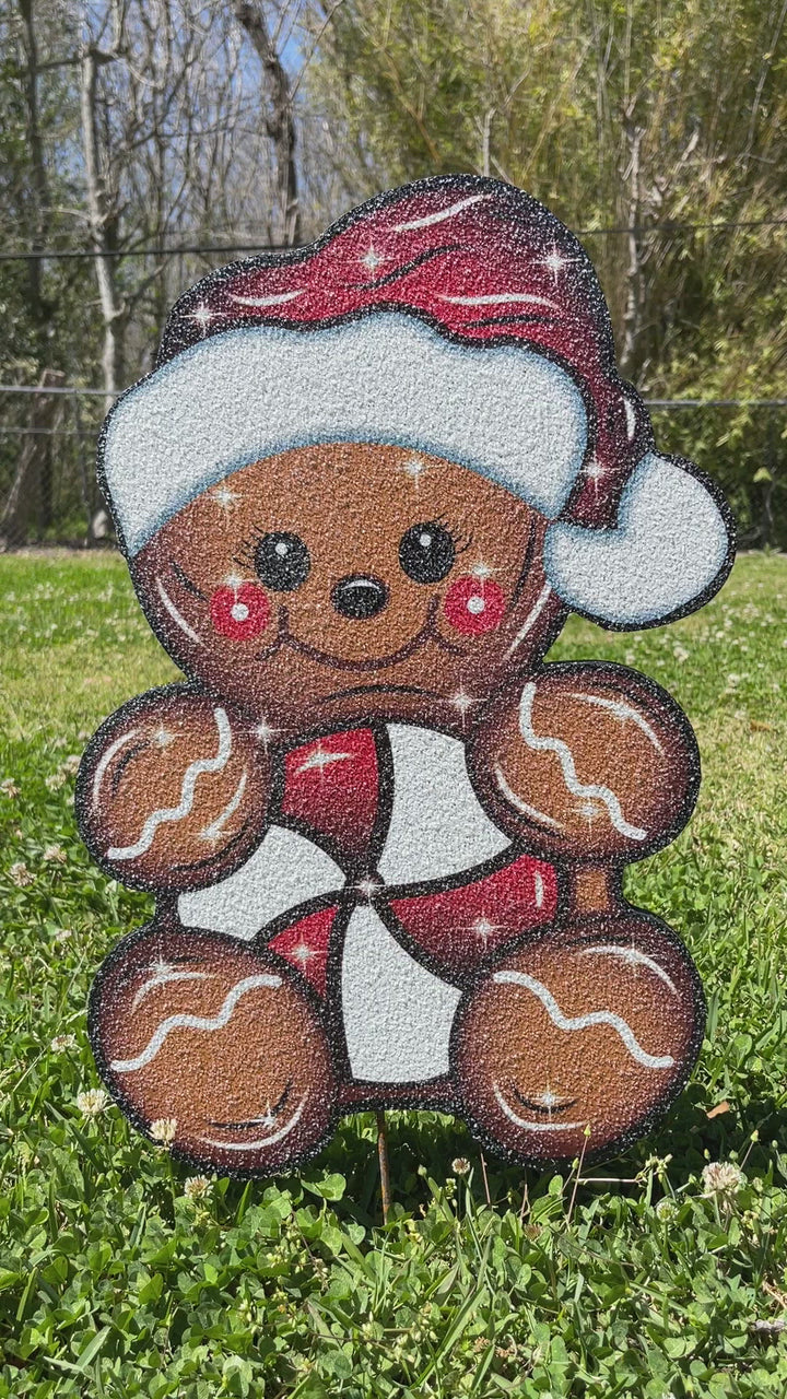 Christmas gingerbread kid with peppermint yard decor