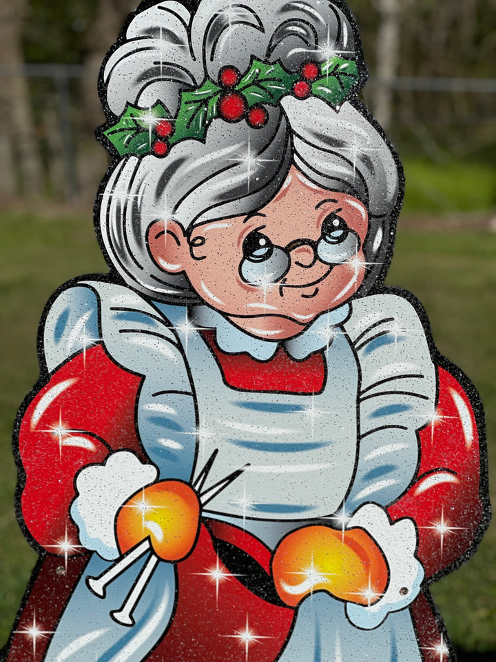 Mrs. Claus yard decoration