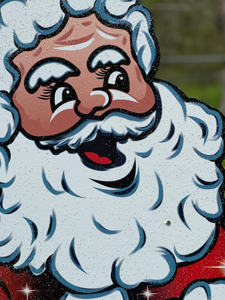 Santa Claus throwing a Football Yard Decoration