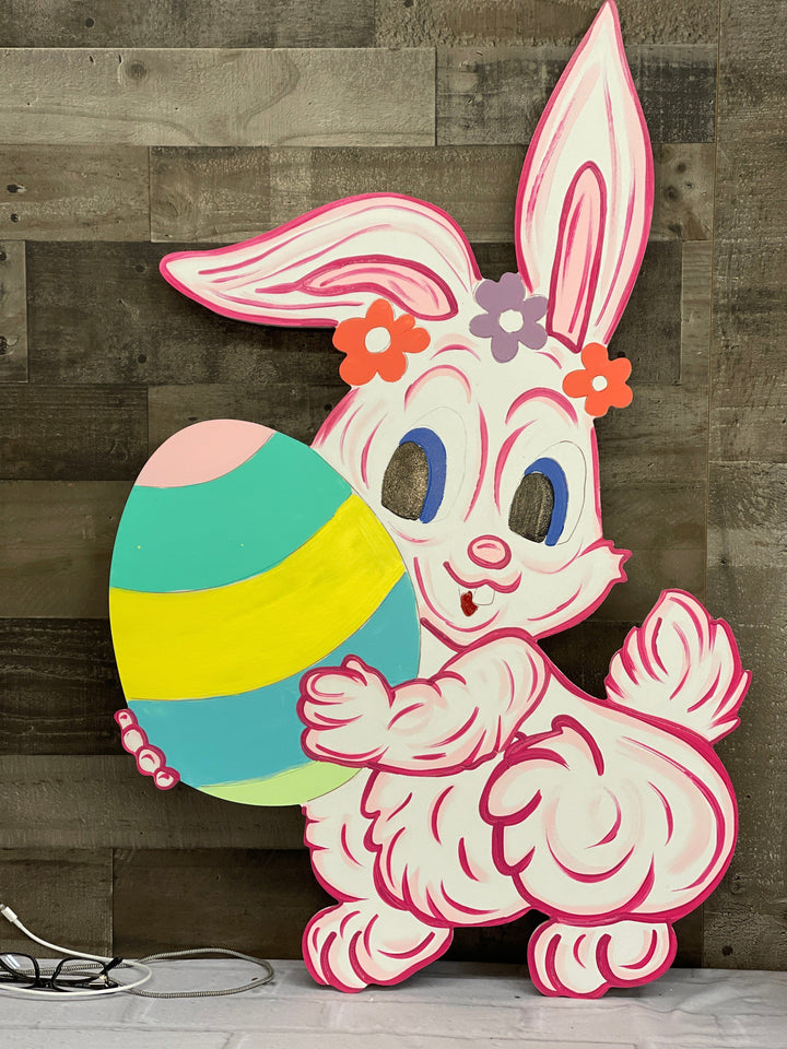 Easter Bunny Holds an Egg Yard Sign