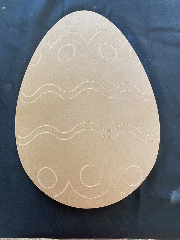 Kid's painting Easter Egg